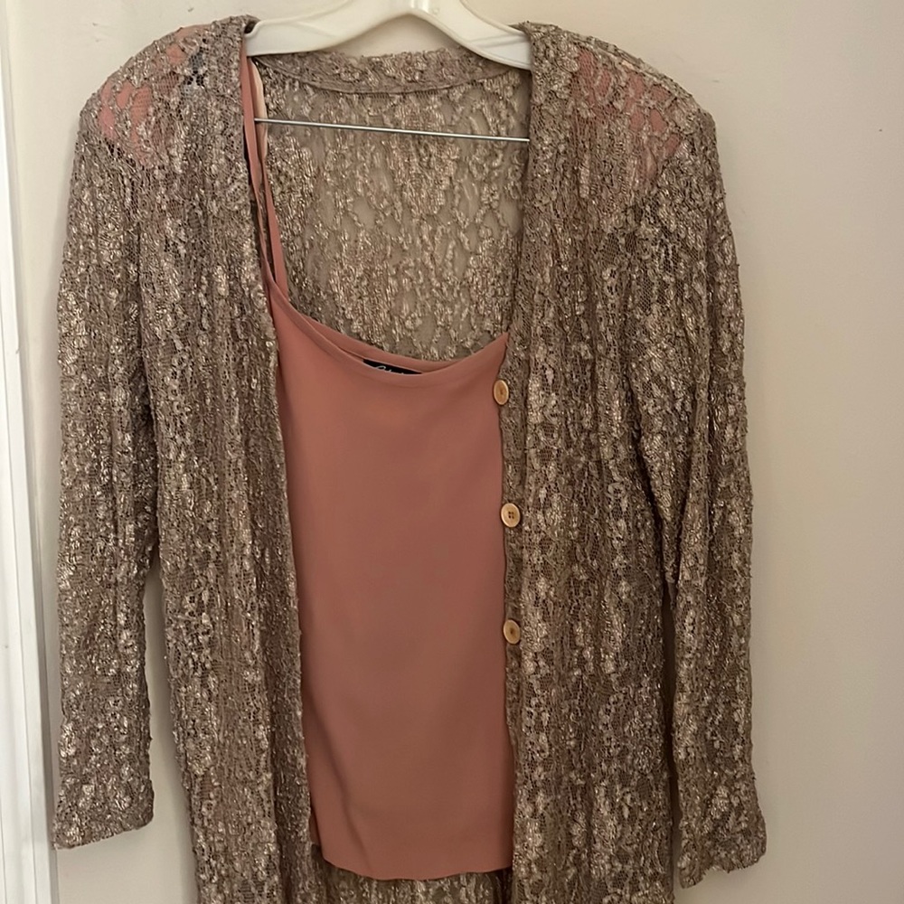 Long, lace jacket over peach colored cami. Women’s size 10.